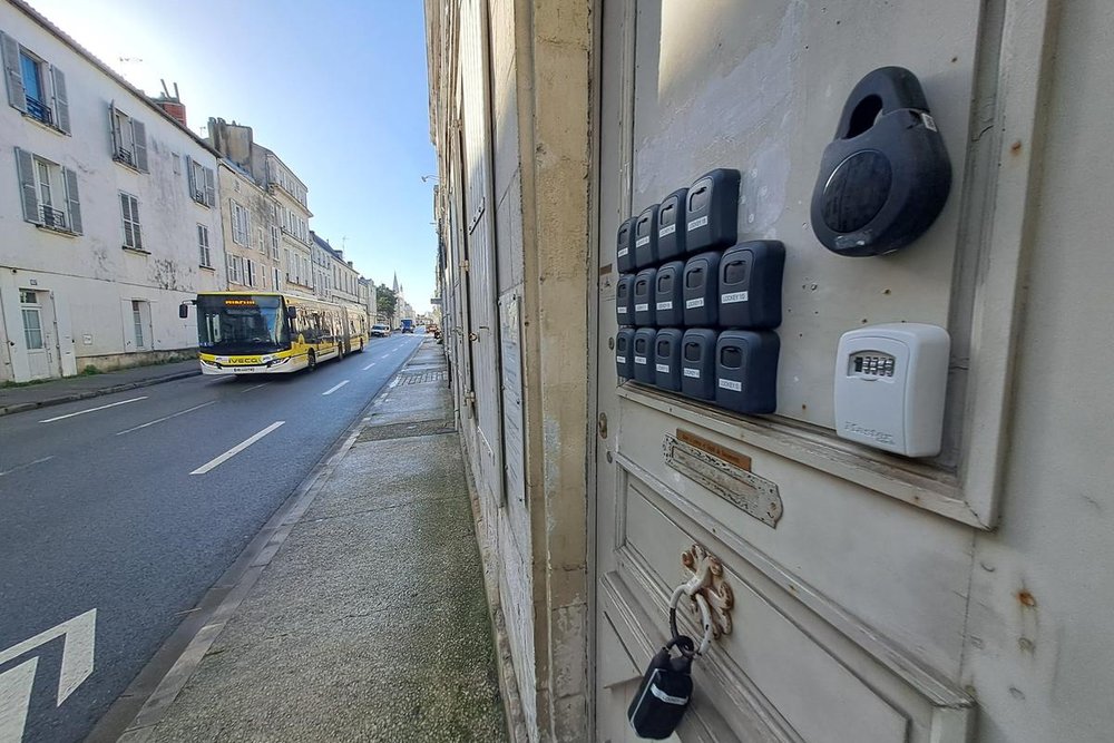 Immeuble en centre-ville comportant plusieurs appartements proposés en location meublée de tourisme