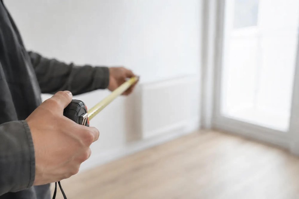Mesurage d'un appartement en copropriété selon la méthode de calcul de la loi Carrez