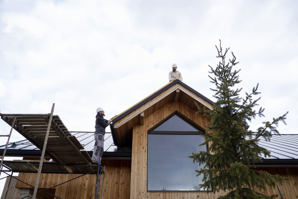 Mesure de la hauteur d'une construction au faîtage et à l'égout du toit par rapport au terrain naturel