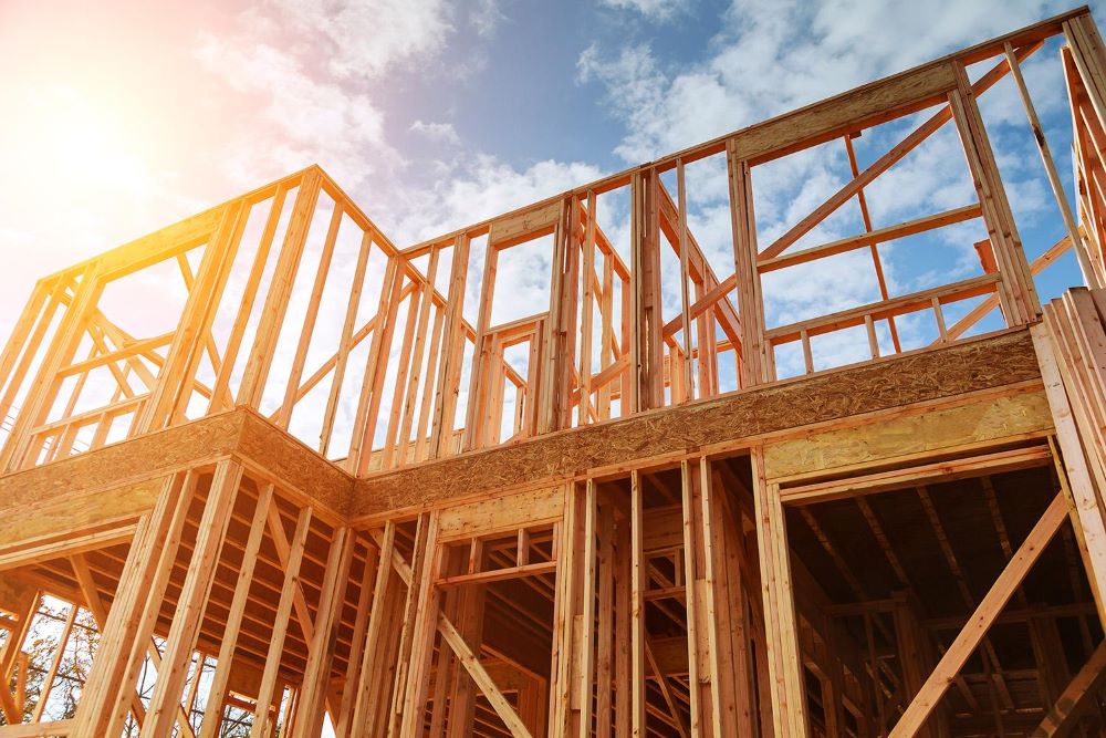 Construction d'une maison RE 2020 en ossature bois avec isolation biosourcée ouate de cellulose