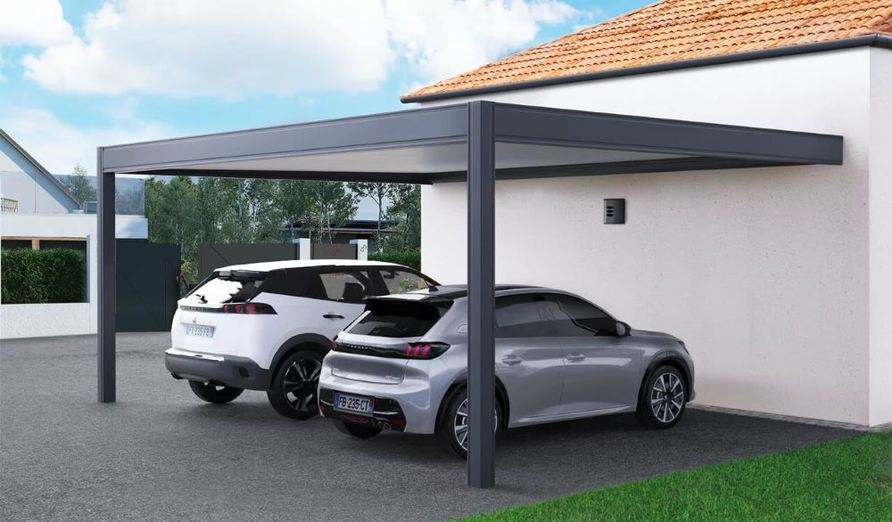Allée de stationnement avec deux places de parking devant une maison individuelle conforme aux règles du PLU